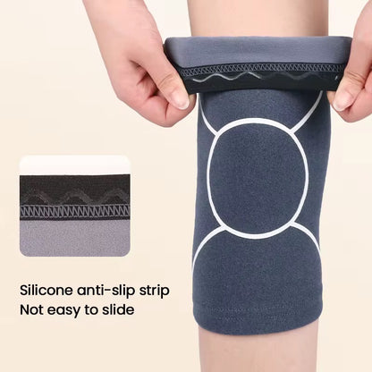 Knävärmare i fleece med halkskydd – värmande stöd med mjuk kompression