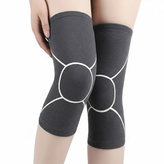 Knävärmare i fleece med halkskydd – värmande stöd med mjuk kompression